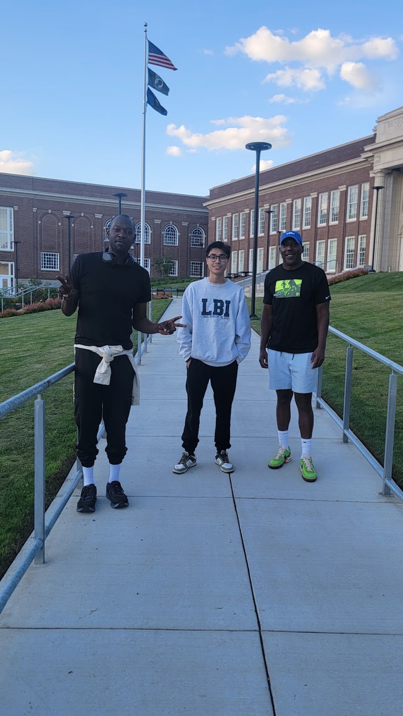 Three walkers outside Benson High School